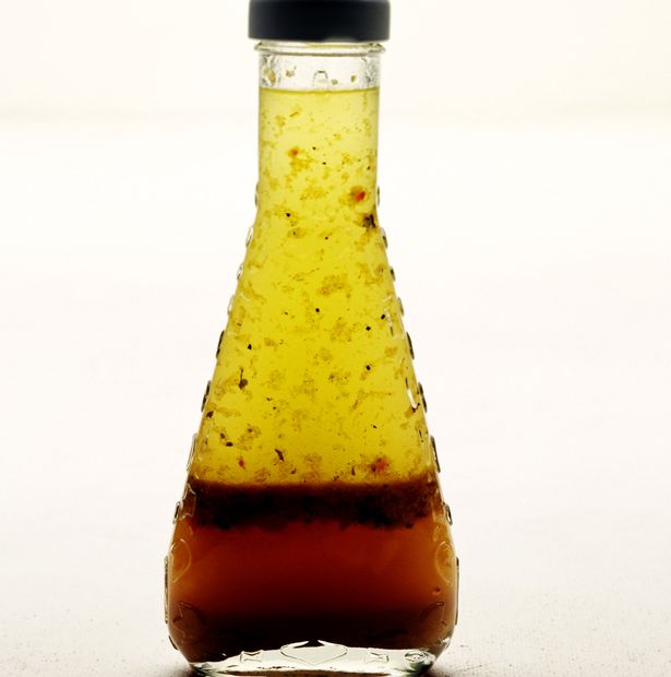 Glass bottle of Italian dressing Everything you know about diets is wrong   and you CAN eat food you think